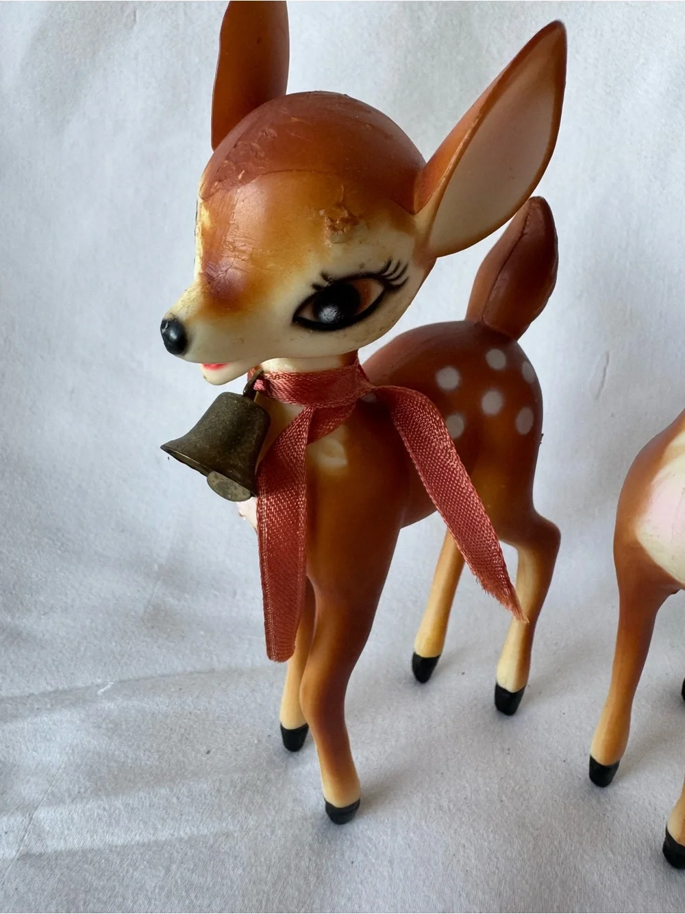 vintage mid-century hard plastic fawn or Bambi figurines, made in Hong Kong 1960